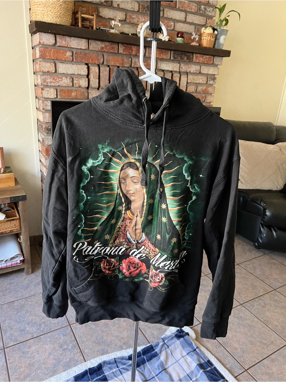 Black Graphic Hoodie with Green & Red Religious Artwork